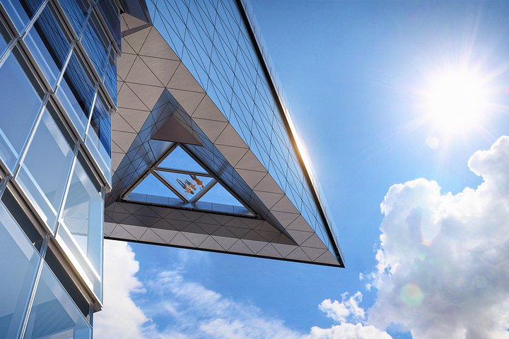 Feel the thrill of standing high above New York City with breathtaking 360-degree views showcasing iconic landmarks beneath a stunning glass floor and unique angled walls.